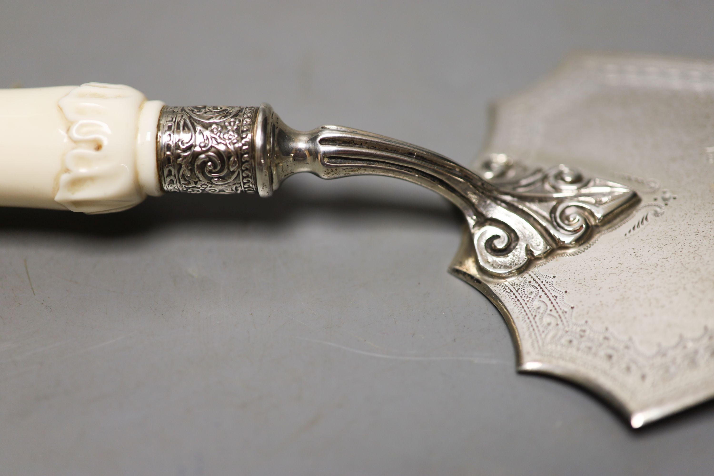 A George V ivory handled silver presentation trowel, with engraved inscription. London, 1928, 33cm, gross weight 8.5oz.